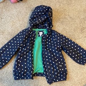 Polka dot rain coat